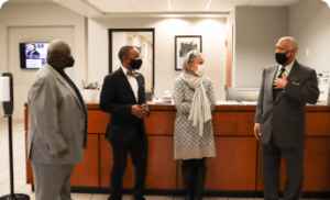Group of people talking in front of office