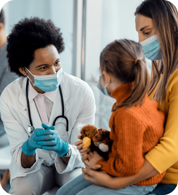 Female doctor talking to kid patient Female doctor talking to kid patient